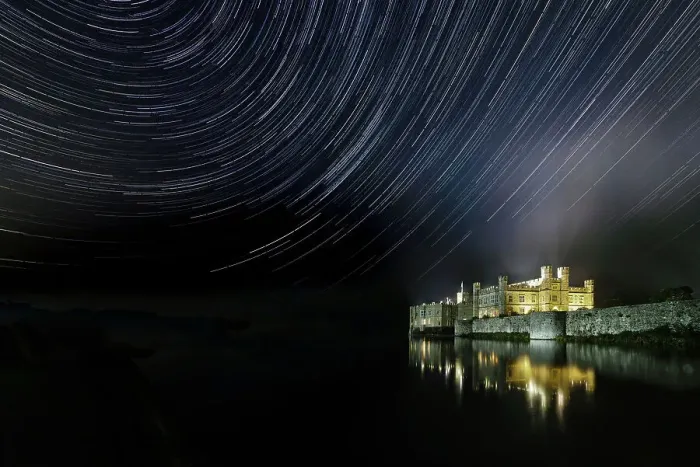 Framed Print : Leeds castle illuminated reflected in moat showing star trails in the night sky, near Maidstone, Kent, England, United Kingdom, Europe Framed Print : Leeds castle illuminated reflected in moat showing star trails in the night sky, near Maidstone, Kent, England, United Kingdom, Europe