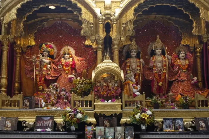Framed Print : From left to right, statues of Krishna, Rada, Rama, with Hanuman in front