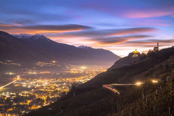 Lenticular sunset from vineyards of Valtellina, Lombardy, Italy, Europe