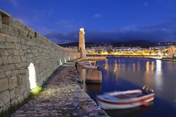 Lighthouse at old Venetian harbour, Rethymno (Rethymnon), Crete, Greek Islands, Greece, Europe