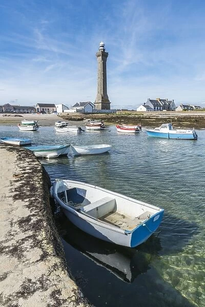 Lighthouse with pier and boats, Penmarch, Finistere, Brittany, France, Europe