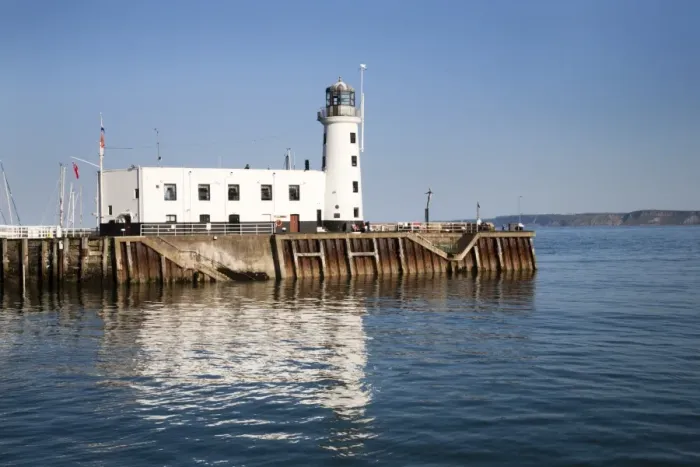 Framed Print : The Lighthouse reflected in the Harbour, Scarborough, North Yorkshire, Yorkshire, England, United Kingdom, Europe Framed Print : The Lighthouse reflected in the Harbour, Scarborough, North Yorkshire, Yorkshire, England, United Kingdom, Europe