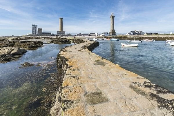 Lighthouses with pier and boats, Penmarch, Finistere, Brittany, France, Europe