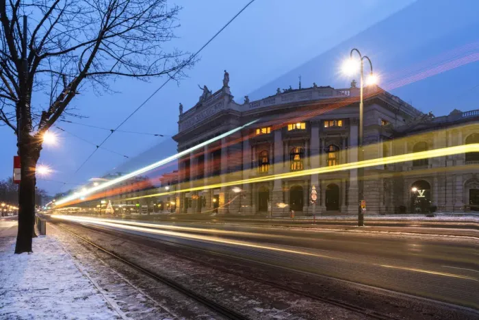 Framed Print : Lights of car trails on the icy road beside the famous Burgtheater (Austrian National Framed Print : Lights of car trails on the icy road beside the famous Burgtheater (Austrian National