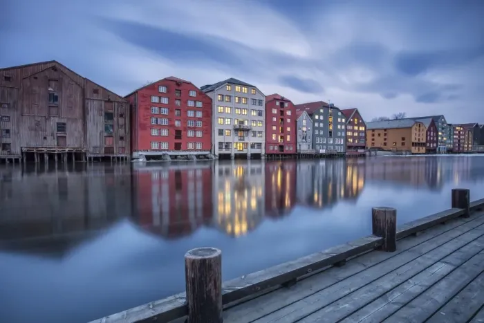 Framed Print : The lights of the houses reflected in the River Nidelva, Bakklandet, Trondheim, Norway Framed Print : The lights of the houses reflected in the River Nidelva, Bakklandet, Trondheim, Norway