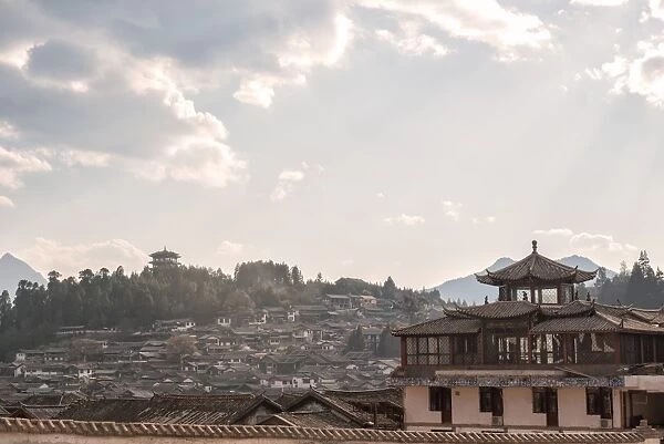 Lijiang architecture with Lion Hill and Wan Gu Tower, Lijiang, Yunnan, China, Asia