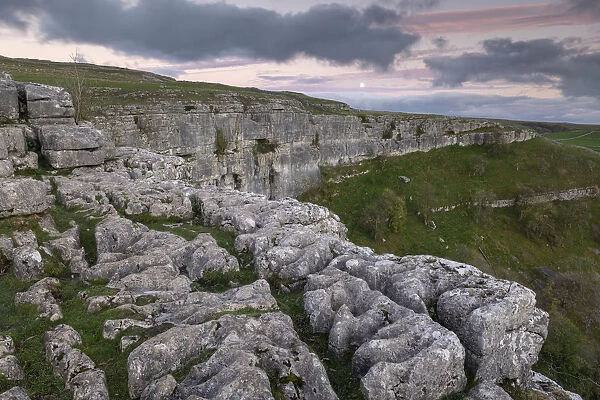 Limestone cliffs above Malham Cove in the Yorkshire Dales National Park, Yorkshire
