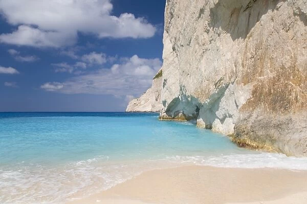 Limestone cliffs towering above turquoise sea, Navagio Bay, Anafonitria, Zakynthos (Zante) (Zakinthos), Ionian Islands, Greek Islands, Greece, Europe