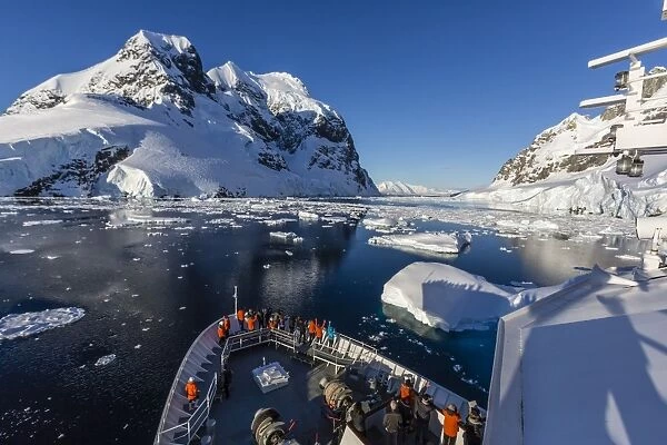 The Lindblad Expeditions ship National Geographic Explorer in the Lemaire Channel