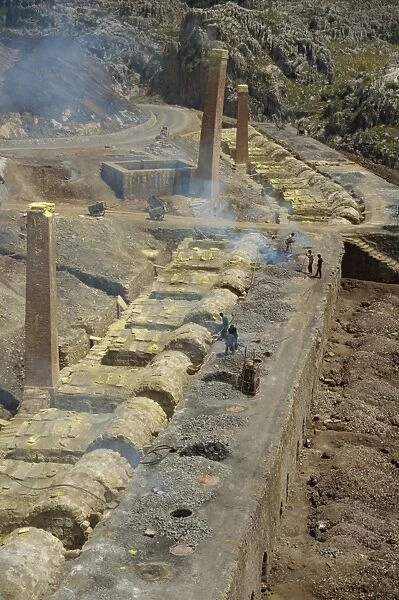 Line of pynto ore furnaces on right and sulphur condensation chambers on left