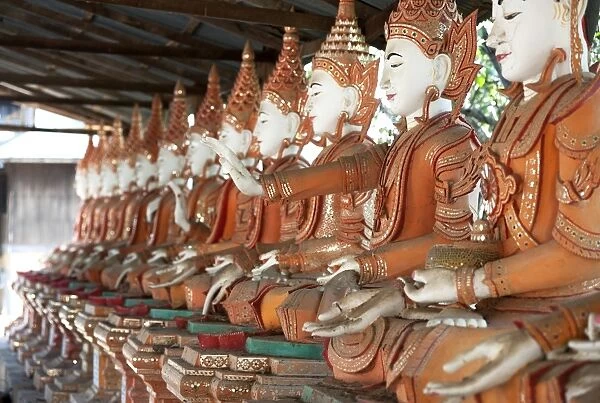 Line of seated Buddhas at the Maha Bodhi Ta Htaung monastery, Monywa township, Sagaing Division