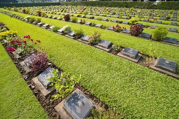Lines of hundreds of graves at Kanchanaburi War Cemetery, Thailand, Southeast Asia, Asia