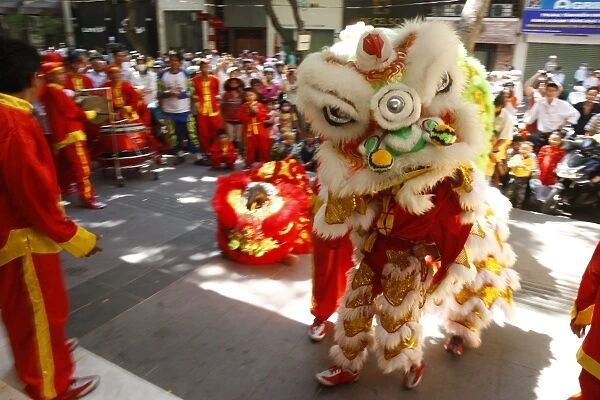 Lion dance performers, Chinese New Year, Ho Chi Minh City, Vietnam, Indochina