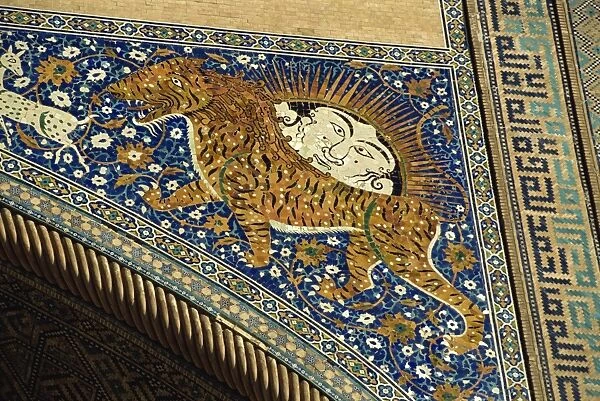 Lion decoration on portal of the 17th century Sher Dor Madressa, Registan Square