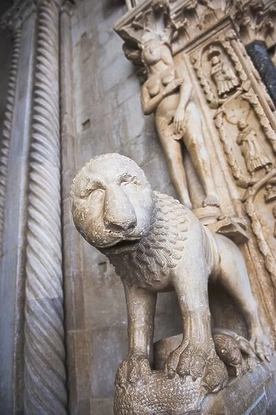 Lion statue at the entrance to St. Lawrence Cathedral, Trogir, UNESCO World Heritage Site, Dalmatian Coast, Croatia, Europe