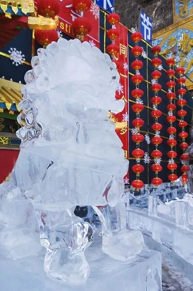 A lion statue ice sculpture at Longqing Gorge Ice sculpture festival, Beijing