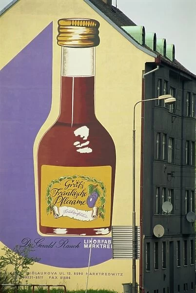 Liqueur advertisement on side of building, Most, North Bohemia, Czech Republic, Europe