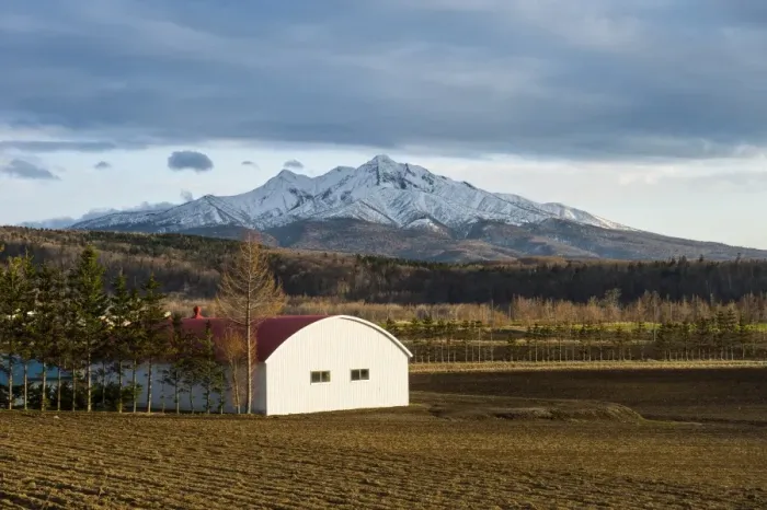 Framed Print : Little farm before a snow capped mountain near the Shiretoko National Park, Hokkaido Framed Print : Little farm before a snow capped mountain near the Shiretoko National Park, Hokkaido