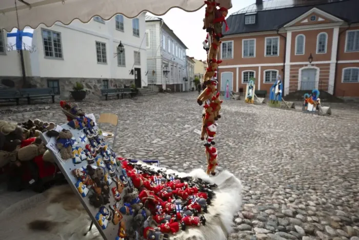 Framed Print : Local handicrafts stall and medieval Town Hall, Old Town Square, Porvoo Framed Print : Local handicrafts stall and medieval Town Hall, Old Town Square, Porvoo