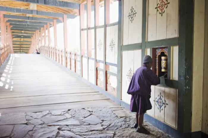 Framed Print : Local man spinning a prayer wheel, Punakha Dzong dating from 1637, Punakha, Bhutan, Asia Framed Print : Local man spinning a prayer wheel, Punakha Dzong dating from 1637, Punakha, Bhutan, Asia