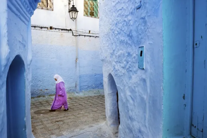 Framed Print : Local women walking through the blue streets of the Medina, Chefchaouen, Morocco Framed Print : Local women walking through the blue streets of the Medina, Chefchaouen, Morocco