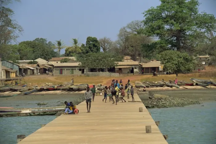 Framed Print : Locals on jetty, Albreda, The Gambia, West Africa, Africa Framed Print : Locals on jetty, Albreda, The Gambia, West Africa, Africa