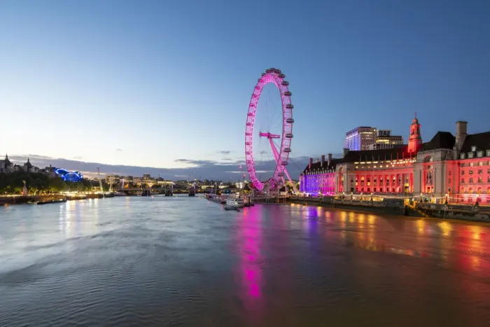 Framed Print : The London Eye lit up pink during blue hour, and River Thames, London, England Framed Print : The London Eye lit up pink during blue hour, and River Thames, London, England