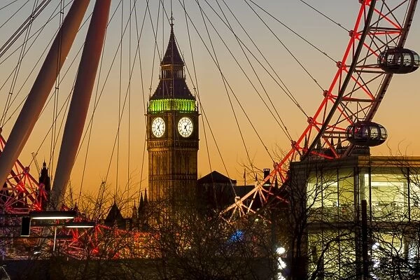 London Eye (Millennium Wheel) frames Big Ben at sunset, London, England, United Kingdom