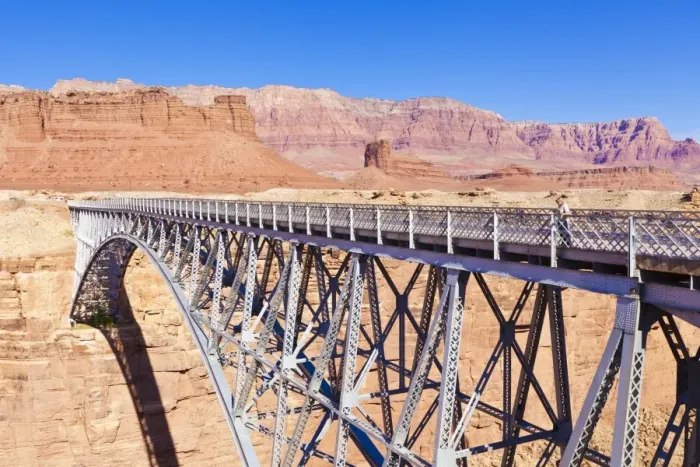 Framed Print : Lone tourist on Old Navajo Bridge over Marble Canyon and Colorado River, near Lees Ferry, Arizona, United States of America, North America Framed Print : Lone tourist on Old Navajo Bridge over Marble Canyon and Colorado River, near Lees Ferry, Arizona, United States of America, North America