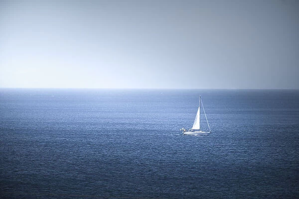 Lonely sail boat in the sea, Antiparos Island, Cyclades, Greek Islands, Greece, Europe