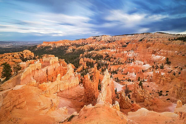 A long exposure captures the beautiful landscape in Bryce Canyon National Park during a summer sunrise, Utah, United States of America, North America