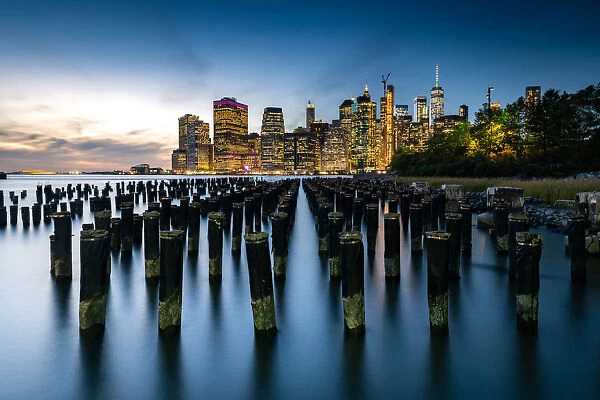 Long exposure of the lights of Lower Manhattan during the evening blue hour as seen