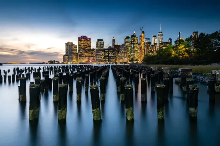 Framed Print : Long exposure of the lights of Lower Manhattan during the evening blue hour as seen Framed Print : Long exposure of the lights of Lower Manhattan during the evening blue hour as seen