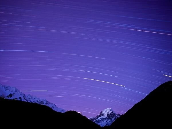 Long exposure of night sky over Aoraki Mount Cook National Park, UNESCO World Heritage Site, South Island, New Zealand, Pacific