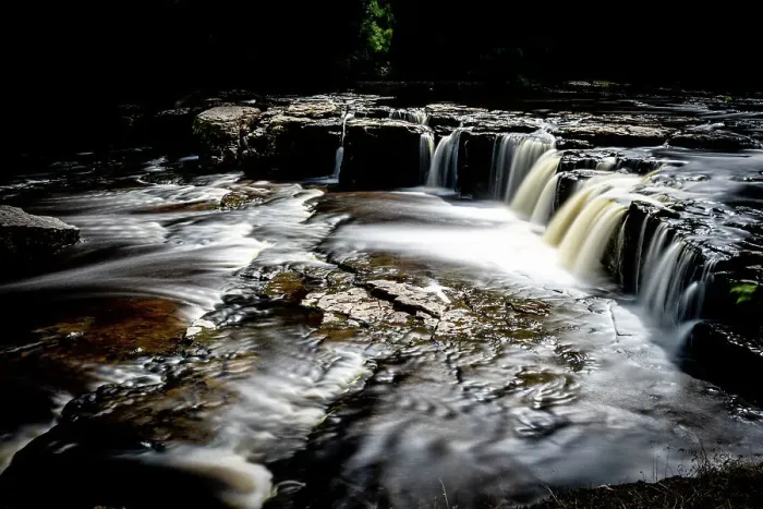 Framed Print : Long exposure of a serene waterfall cascading over rocky ledges, North Yorkshire, England, United Kingdom, Europe Framed Print : Long exposure of a serene waterfall cascading over rocky ledges, North Yorkshire, England, United Kingdom, Europe