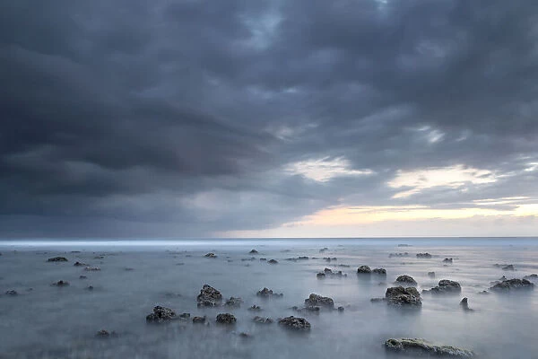 Long exposure of a storm approaching the Gili islands, Lombok, Indonesia, Southeast Asia