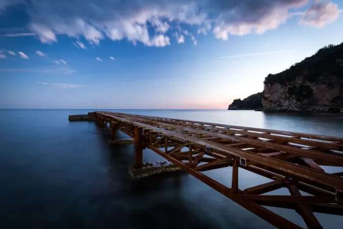 Framed Print : A long exposure during sunset of an old jetty on the beach of Budvas old town (stari grad) Framed Print : A long exposure during sunset of an old jetty on the beach of Budvas old town (stari grad)