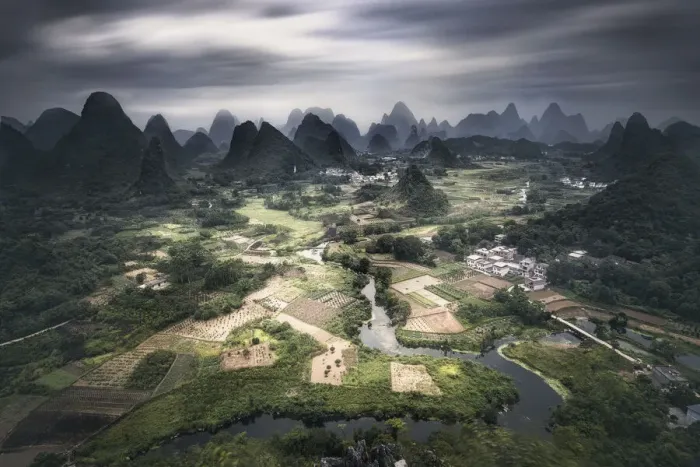 Framed Print : Long exposure of Yangshuo mountains with dark clouds, Yangshuo, Guangxi, China, Asia Framed Print : Long exposure of Yangshuo mountains with dark clouds, Yangshuo, Guangxi, China, Asia