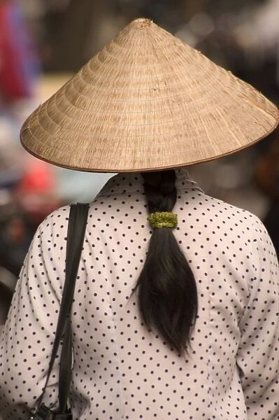 Long hair, lady wearing conical hat
