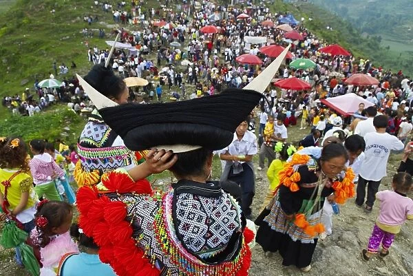 Long Horn Miao girls in traditional costumes celebrating summer Festival, around Zhijian, Guizhou Province, China, Asia