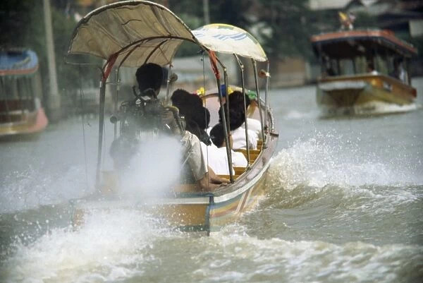 Long tail boat river ferry on the klongs in Bangkok