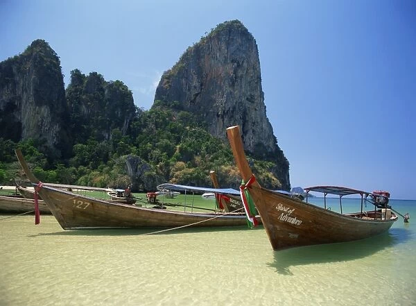 Long tail boats moored on Railay Beach