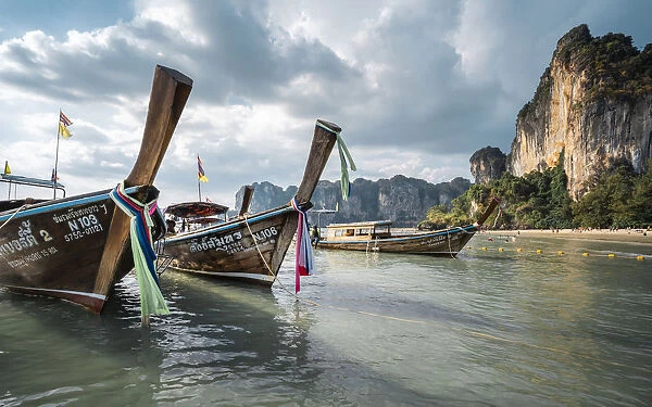 Long tail boats on Railay beach in Railay, Ao Nang, Krabi Province, Thailand