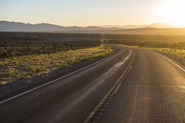Long winding road at sunset in eastern Nevada, United States of America, North America