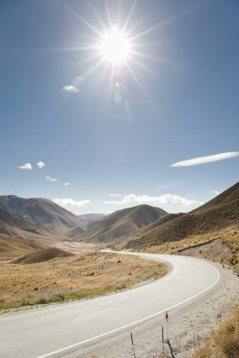 Framed Print : Long winding road through a valley, Otago, South Island, New Zealand, Pacific