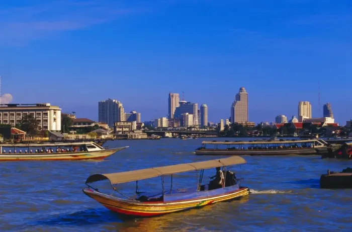 Framed Print : Longtail boat and city skyline Framed Print : Longtail boat and city skyline