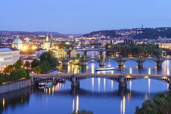 Looking down the Vltava River to Manesuv, Charles and Legii bridges connecting the