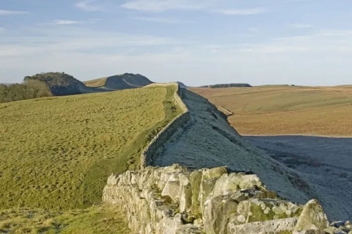 Framed Print : Looking west from Kings Hill to Housesteads Wood, Hotbank and Cuddy Crags