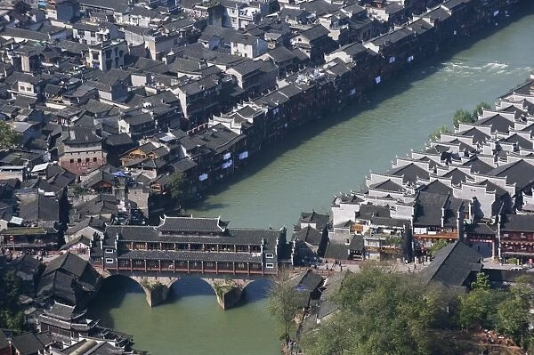 Looking down on a wind and rain bridge in the old town of Fenghuang, Hunan Province