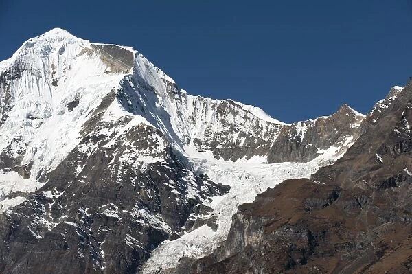 The looming face of Jomolhari, third highest mountain in Bhutan at 7326m, seen from Jangothang